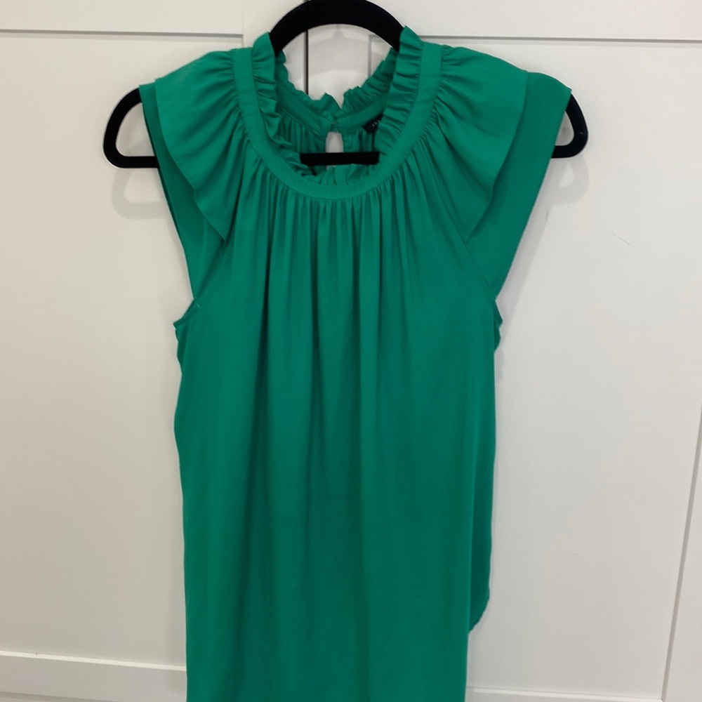 Green blouse shirt sleeve
